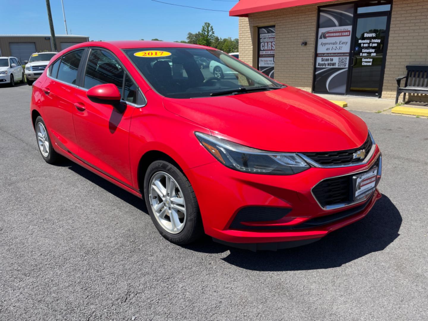 2017 Red Chevrolet Cruze (3G1BE6SM5HS) with an 4-Cyl, Turbo, 1.4 Liter engine, Automatic, 6-Spd transmission, located at 8008 Warden Rd, Sherwood, AR, 72120, (501) 801-6100, 34.830078, -92.186684 - Photo#1